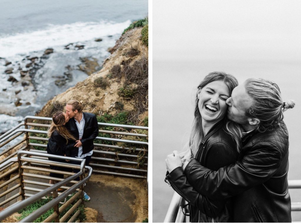 Couple laughing on stairs at the beach